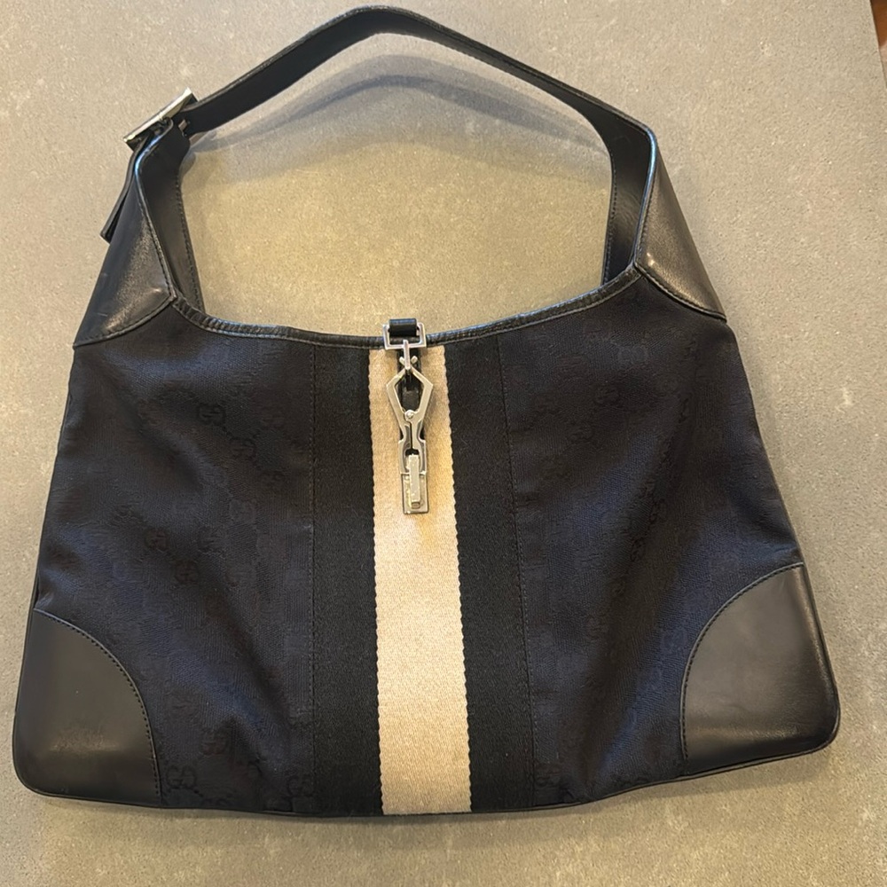 Gucci purse navy with silver hardware 💯authentic GG Canvas Jackie leather